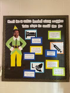 a bulletin board with an image of a man in green and yellow clothes on it