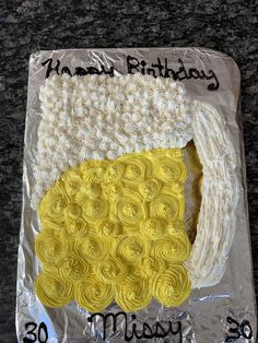 a birthday cake made to look like a beer mug