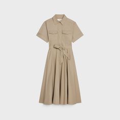 SAFARI DRESS IN LIGHTWEIGHT GABARDINE - Beige | CELINE Formal Spread Collar Shirt Dress With Pockets, Classic Workwear Dresses With Buttoned Pockets, Classic Dresses With Buttoned Pockets, Classic Button-up Dress With Buttoned Pockets, Collared Shirt Dress With Buttoned Pockets For Work, Classic Cotton Dresses With Pockets, Classic Cotton Dress With Pockets, Formal Button-up Shirt Dress With Pockets, Classic Fitted Shirt Dress With Pockets