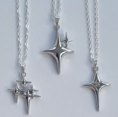 Three matching silver star necklaces, the perfect gift for a friendship or sibling trio.  Each design is similar but different, and available separately using the links below. Chains can be personalised to either 18, 20 or 22 inch depending on your personal preference, please see the photos for reference.  Every item is handmade to last using durable materials. Your order will arrive with a jewellery cloth, and protective pouch to keep the pieces looking brand new.    Each product is individually packaged on display cards with a protective sleeve. The shipping box is unbranded on the outside, so it won't give any secrets away! If sending the items directly to a gift recipient, please mark the item as a gift at checkout.  Material Information:  925 / Sterling Silver is considered hypoallerg Silver Star Charm Jewelry For Friendship, Three Bff, Star Necklaces, Silver Star Necklace, Friend Groups, North Star Necklace, Star Necklace Silver, Experience Gifts, Sterling Silver Necklace Pendants