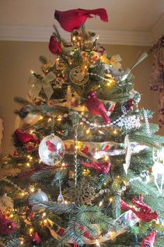 a christmas tree decorated with ornaments and lights