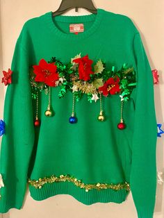 One of a kind ugly Christmas sweater to make your holidays even better. This sweater will look good on anyone regardless their age . It's all about the Christmas spirit ! All the sweaters are new . I glued embellishments onto the sweater which some I made ,some are found. * if you need to add more ugly things 😁( I mean embellishments) just feel free to contact with me. Because of handmade every piece is unique , sometimes it has not accurate always ( I use various kinds of small embellishments) Christmas Sweater Party Ugly Christmas Sweater, Christmas Sweaters Lit, Grinch Party Ugly Christmas Sweater, Best Ugly Christmas Sweater Staticthreads, Grinch Christmas Party Ugly Christmas Sweater, Ugly Christmas Sweaters With Snowman, Best Ugly Christmas Sweater For Work, Vinyl Ugly Christmas Sweater, Posada Ugly Sweater