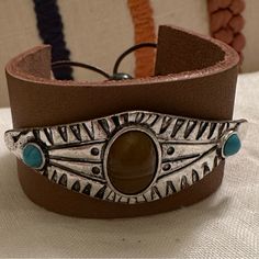 Boho/Western Style Leather Cuff With Silver & Turquoise & Brown Accents. Semi Precious Bead On Adjustable Leather Cord Boho Western Style, Free People Jewelry, Leather Cuff Bracelet, Semi Precious Beads, Leather Cuffs Bracelet, Brown Silver, Leather Cuffs, Silver Turquoise, Western Style