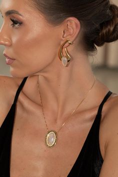 - Chic Gold Jewelry With Large Pendant, Chic Gold Jewelry With Jewels, Chic Gold Plated Pearl Pendant Jewelry, Chic White Gold Plated Jewelry, White Brass Jewelry For Party, Chic Gold Necklaces With Gemstone, Chic Gold Necklace With Gemstone, Gold Gemstone Jewelry Long Necklace, Minimalist Gold-plated Jewelry With Large Pendant