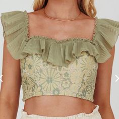 Nwt Beige/Olive Crop Top Lined On Or Off-Shoulder Style Accordion Pleat Frill Trim Lace Overlay Zipper In Back Stop Whatever You Are Doing And Take A Moment To Behold The Beauty That Is Our Dreamy Crop Top. It Features A Gorgeous Embroidered Lace Overlay And Can Be Worn On Or Off-Shoulder Style. Pair It With Simple Nude Heels And A Chic Skirt Because And Watch Jaws Drop. Chic Green Off-shoulder Top, Green Off-shoulder Party Top, Green Summer Party Top, Fitted Green Crop Top With Ruffles, Green Fitted Crop Top For Brunch, Chic Green Crop Top, Green Crop Top For Spring, Green Cropped Top For Brunch, Green Spring Crop Top For Brunch