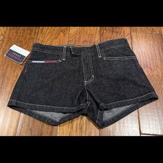 Tommy Hilfiger Shorts Womens Size 3 Black Denim Mid Rise Jean Shorts 90s Y2k Nos. This Is A Great Listing A For A New With Tag Pair Of 90s-Y2k Black Denim Jean Shorts From Tommy Hilfiger. Theses Have The Red, White And Navy Logo On The Right Front Pocket. These Are New Old Stock! Please See Pictures For Measurements And More Details. These Are Truly Now So There Are No Stains, Rips, Or Signs Of Wear. These Come From A Smoke Free And Pet Free Home. Thanks For Looking And Have A Great Day! Fitted Jean Shorts For Streetwear, Casual Fitted Jean Shorts For Streetwear, Black Cotton Y2k Jean Shorts, Y2k Black Cotton Jean Shorts, Y2k Black Jean Shorts, Y2k Black High Waist Jean Shorts, Casual Mid-rise Bottoms By Tommy Hilfiger, Y2k Mid-rise Shorts For Streetwear, Tommy Hilfiger High Waist Casual Bottoms