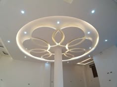 the ceiling is decorated with circles and lights