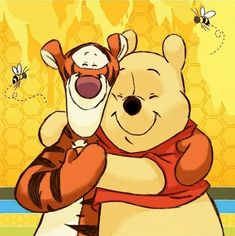 winnie the pooh hugging a big teddy bear