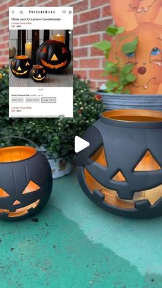 two halloween pumpkins sitting next to each other in front of a brick wall and potted planter