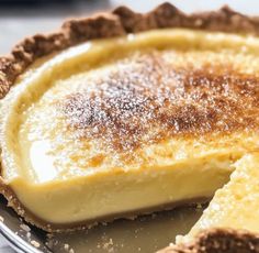 a close up of a pie on a plate