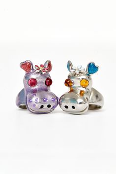 Hippo ring in silver with orange eyes and blue heart ears. Hand painted. 100% recycled pewter Hippo measures 0.75 x 1.25" Made in USA This is a costume jewelry piece. Please use care with this item and do not wear while bathing or swimming. Excessive wear may cause the finish to deteriorate. Jewelry bag handmade with fabric scraps from our NY studio. Each jewelry bag is one of a kind. Orange Eyes, Jewelry Bag, Bag Handmade, Blue Heart, Ring Silver, Jewelry Bags, Fabric Scraps, Costume Jewelry, Jewelry Pieces