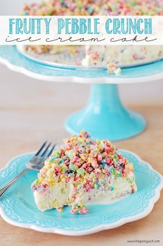 a piece of cake with sprinkles on a blue plate next to a fork