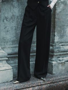 Flowing high-waisted palazzo trousers crafted from a textured suiting fabric and finished with delicate pleats at the front. Pair them with the matching waistcoat and oversize blazer to create a low-key three-piece suit.- loose fit- high waistline- pleats at the waist Chic High-waisted Evening Suits, Chic Evening Suits With High-waisted Pants, Elegant Wide Leg Pantsuit With Pressed Crease, Tailored Wide Leg Suits For Work, Timeless Wide Leg Pantsuit, Chic Wide-leg Pants Suits For Office, Timeless Wide Leg Pantsuit For Office, Chic Wide Leg Pants With Pressed Crease For Evening, Chic Tailored Full-length Pantsuit