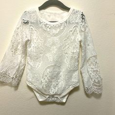 Whit Lace Kind Of Like A Floral Print Bodysuit With Matching Jeans. Size 12 Months. Never Worn. Cute White Stretch Bodysuit, White Fitted Onesie For Baptism, Fitted White Onesie For Baptism, White Summer Onesie For Baptism, White Onesie For Baptism In Summer, White Onesie For Baptism In Spring, White Stretch Playwear Sets, White Stretch Bodysuit For Playtime, White Long Sleeve Onesie For Baptism