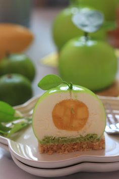 an apple slice is cut in half on a plate