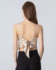 Type: Tie Back Silk Camisole.Material: 19 Momme Luxury Mulberry Silk.Details: Classic Solid Color, Designed Tie-back&Bow, Regular Fit. Introducing our exquisite silk camisole - This camisole top features a square neckline and a backless design secured with two ribbons that can be tied into a bow or other styles. Perfect for layering under blazers or suits during the day, it effortlessly transitions to an elegant standalone piece for evening events and parties. SIZE: CM / INCH SIZE Bust Length XX Elegant Backless Tank Top With Built-in Bra, Chic Tank Vest With Built-in Bra, Satin Tank Top With Built-in Bra, Fitted Tie Back Camisole, Elegant Backless Tie-back Tank Top, Sleeveless Tie Back Tank Top For Night Out, Elegant Backless Tank Top With Adjustable Straps, Fitted Camisole With Tie Back And Tank Straps, Chic Sleeveless Vest With Built-in Bra