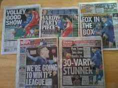 several newspapers are stacked on top of each other with pictures of soccer players in them