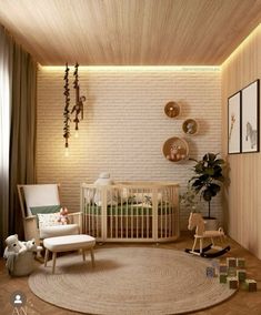 a baby's room with white brick walls and wooden floors