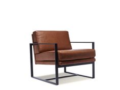 a brown leather chair sitting on top of a metal frame