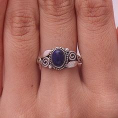 "Lapis Lazuli Ring / 925 Sterling Silver Ring / Oval Gemstone Ring / Hippie Jewelry / Boho Ring / Women Ring / Gift for Her. Gemstone Name - Lapis Lazuli. Stone Quality - AAA Ring Wight -  2.22  gm  Stone  Length -0.6 cm  Stone  Width - 0.4 cm  Stone Shape - As shown in the picture. Ring Size - All Ring Size Available. You'll get the exact product as shown in the pictures We serve complete 925 sterling silver Jewelry and genuine properties of the stone. The products are dispatched from the small business from USA. Product Quality and Packaging - Our all products are 925 Silver Stamped which shows that the product is genuine and authentic .The products are dispatched from the small business from USA so you get the product on time and the product packaging comes in bubble foil wrap with all Adjustable Oval Sapphire Ring In Sterling Silver, Oval Cabochon 925 Stamped Promise Ring, Sterling Silver Oval Cabochon Promise Ring, Vampire Ring, Picture Ring, Lapis Lazuli Ring, Hippie Jewelry, Ring Oval, Jewelry Boho