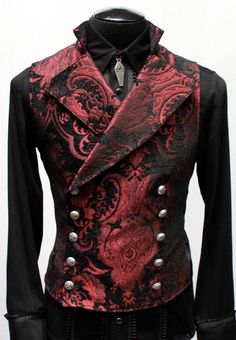 "An elegant double breasted vest for formal occasions. A fitted vest made in rich red and black tapestry fabric with a stand up top collar and wide sweeping lapels. Fastens on the inside with a sturdy button and buttons on the outside with five engraved metal buttons. The vest back and inside lining is made from rich black satin. Comes in sizes small-XXXL. Wonderful! Measurements: Small: Chest 39\" Stomach 36\" Waist 34\" Medium: Chest 42\" Stomach 38\" Waist 36\" Large: Chest 44\" Stomach 42\" Formal Red Vest For Fall, Elegant Fitted Red Vest, Fitted Red Winter Vest, Fitted Red Vest For Winter, Red Fitted Sleeveless Vest, Fitted Gothic Vest For Winter, Masquerade Outfit Ideas, Black And Red Suit, Masquerade Outfit