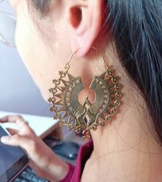 Gold Brass Earrings, Mandala Earrings, Hoop Earrings, Bohemian Earrings, Handmade Earrings, Mothers Day Gift, Minimalist Jewelry 1. Please share your numbers (in personalization box ) as required for shipping address details, and it'll help us to contact you easily. And don't worry about the privacy, we'll keep it safe with us, So try to cooperate with us. :) 2.Customers' satisfaction is our biggest priority, please contact us with any questions/queries for future or existing orders, and we will do our best to make sure you are happy with your order. 3.Please make sure to add the correct address during checkout. You can return your purchased item within 15 days after successful delivery. We offer a 100% "Money Back Guarantee" if you are not satisfied with your purchase. Return charges will Bohemian Metal Plug Earrings For Pierced Ears, Bohemian Dangle Wrap Earrings For Pierced Ears, Bohemian Dangle Wrap Earrings, Single Wrap Earring For Festivals, Bohemian Single Wrap Drop Earring, Bohemian Brass Wrap Earrings As Gift, Bohemian Hoop Wrap Earrings, Gold Bohemian Wrap Earrings For Festivals, Bohemian Gold Wrap Earrings For Festival