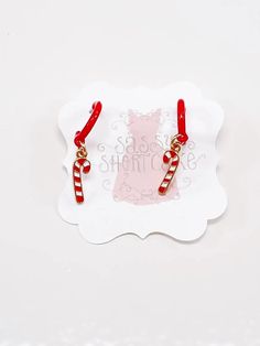 Candy Cane Earrings | Sassy Shortcake | sassyshortcake.com Sweet Red Jewelry For Valentine's Day, Red Ear Wire Jewelry For Holidays, Cute Red Christmas Earrings, Cute Red Earrings For Christmas, Sweet Red Earrings For Gift, Red Jewelry For Christmas Birthday, Red Dangle Earrings For Birthday, Gift Red Nickel-free Hoop Earrings, Gift Red Nickel Free Hoop Earrings