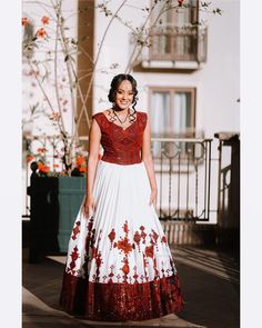 Description Embark on a journey of timeless love and tradition with our breathtaking Habesha Wedding Dress, adorned in captivating shades of crimson and scarlet. Handcrafted with meticulous care, each gown is a fusion of Ethiopian heritage and modern allure. The rich red hue symbolizes passion and prosperity, making it the perfect choice for your special day. With intricate designs and exquisite details, this dress embodies the essence of elegance and grace. Elevate your wedding ensemble with the unforgettable charm of Habesha dress, a symbol of everlasting love and cultural richness. Material Cotton Menen Thread Estimated delivery : 3 weeks to 5 weeks Delivered to your door 14days return policy Free shipping to North America (The US & Canada), EU & UK, UAE & Qatar Contact WhatsApp +1(304) Red Anarkali Gown For Traditional Ceremonies, Red Floor-length Gown For Traditional Ceremonies, Red Bollywood Dress For Wedding, Red Bollywood Wedding Dress, Red Saree Dress For Traditional Ceremonies, Traditional Red Dress For Reception, Red Gown With Cutdana For Wedding, Traditional Red Wedding Dress For Festive Season, Red Wedding Gown With Cutdana Details