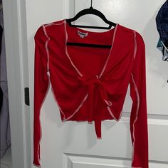 Never Worn Verge Girl Crop Top. Ties In The Front. Great Condition! Red Long Sleeve Trendy Crop Top, Trendy Red Long Sleeve Crop Top, Cute Red V-neck Top, Red Long Sleeve Cotton Crop Top, Cute Red Party Top, Cute Red Crop Top For Spring, Spring Red V-neck Crop Top, Trendy Red Crop Top For Day Out, Cute Red Top For Spring