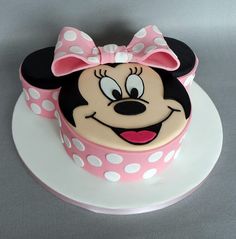 a cake with a minnie mouse face on it