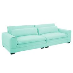 a light blue couch sitting on top of a white floor