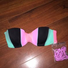 Brand New Victoria Secret Bandeau Swim Top With Tags! Size 32b. Colors Are: Aqua, Hot Pink, Light Purple, And Black Feel Free To Make Offers! Trendy Strapless Tube Top For Poolside, Trendy Pink Strapless Tube Top, Multicolor Strapless Tube Top For Beachwear, Trendy Multicolor Bandeau Tube Top, Pink Summer Tube Top For Beach, Pink Summer Tube Top For The Beach, Pink Tube Top For Beach Party Season, Trendy Pink Tube Top For Vacation, Pink Tube Top For Poolside And Beach Season