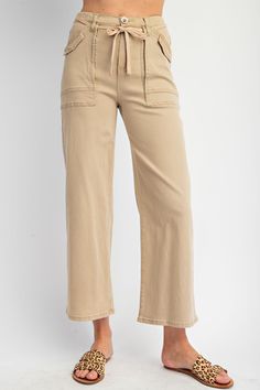 Introducing the Jaycie Tie-Belt Utility Pants, the perfect addition to your wardrobe. These pants feature a front zipper and button closure for a secure fit, while the self-tie belt adds a touch of style. With a straight leg fit and finished hem, these pants are both flattering and versatile. Made from stretch twill fabric, they offer a comfortable and flexible fit. Upgrade your wardrobe with the Jaycie Tie-Belt Utility Pants, available now! Stretch Twill Washed Front Zipper and Button Closure E Utility Pants, Belt Tying, Twill Fabric, Tie Belt, Bottoms Pants, Front Zipper, Elastic Waist, Straight Leg, Zipper