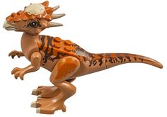 an orange and black toy dinosaur with horns