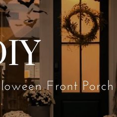 the front door of a house decorated for halloween with wreaths and decorations on it