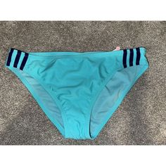 Get Ready To Hit The Beach In Style With This Stunning Adidas Sport Hipster Bikini Swim Bottom. Made From High-Quality Spandex Material, This Bikini Bottom Is Perfect For Any Woman Who Wants To Look And Feel Her Best On The Beach. The Beautiful Blue Color And Hipster Theme Make This Bikini Bottom A Must-Have For Any Fashion-Conscious Woman. The Bikini Bottom Is Brand New With Tags And Has Never Been Worn Before. It Is Available In Size Xl And Is Suitable For Regular Size Types. This Bikini Botto Hipster Style, Adidas Sport, Hipster Fashion, Sporty Look, Swim Bottoms, Blue Adidas, Adidas Logo, Beautiful Blue, Skin Tone