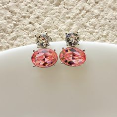 Pink Earrings featuring semi precious pink stone and cz diamond. Ideal to pair with your formal to casual outfit and also in parties. These LUXURY style blue crystal earrings surely elevate your look. Perfect gift for her. *𝐏𝐑𝐎𝐃𝐔𝐂𝐓 𝐃𝐄𝐓𝐀𝐈𝐋* * 𝐌𝐚𝐭𝐞𝐫𝐢𝐚𝐥: Brass * 𝐏𝐥𝐚𝐭𝐢𝐧𝐠: White Rhodium Plated * 𝐒𝐭𝐨𝐧𝐞: AAA-quality CZ Diamond. *𝐃𝐈𝐌𝐄𝐍𝐒𝐈𝐎𝐍𝐒* * 𝐖𝐞𝐢𝐠𝐡𝐭: 3 gm each * 𝐋𝐞𝐧𝐠𝐭𝐡: 1.7cm * 𝐖𝐢𝐝𝐭𝐡:  1.4 cm * 𝐂𝐥𝐨𝐬𝐮𝐫𝐞: Push Back 𝐕𝐢𝐬𝐢𝐭 𝐎𝐮𝐫 𝐅𝐀? Pink Diamond Earrings With Accents For Wedding, Pink Diamond Earrings With Diamond Accents For Wedding, Pink Sparkling Stone Round Earrings, Pink Round Earrings With Sparkling Stones, Pink Diamond Earrings For A Gift, Pink Diamond Earrings Gift, Pink Diamond Earrings As Gift, Pink Diamond Earrings With Diamond Accents, Pink Sparkling Round Earrings