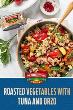 roasted vegetables with tuna and orzo in a bowl on top of a white table