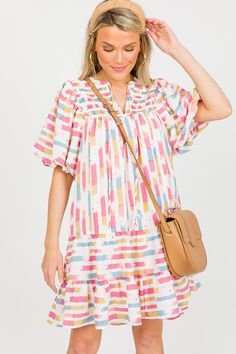 Segment Stripes Dress, Cream Pink - New Arrivals - The Blue Door Boutique Casual Multicolor Tiered Dress With Ruffle Hem, Spring Multicolor Tiered Dress, Multicolor Tiered Dress For Spring, Casual Flowy Tiered Dress With Puff Sleeves, Multicolor Flowy Tiered Dress For Spring, Flowy Multicolor Tiered Dress For Spring, Multicolor Smocked Dress With Ruffles And Short Sleeves, Casual Dress With Ruffle Hem And Balloon Sleeves, Multicolor Short Sleeve Smocked Dress For Spring