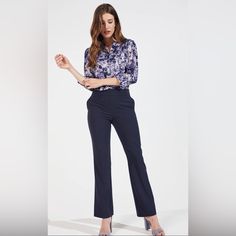 For Those Working In The Corporate Field, You Simply Can’t Have Enough Of This. These Slight Bootcut Pants Will Be An Easy Favorite Because Of Their Pull-On Two-Inch Waistband Tummy Control Design. Whether Worn With A Printed Or A Solid-Colored Blouse, It’s Guaranteed To Make Your Workwear More Stylish And Far From Being Stiff. Pants Details: Pull On 2" Waistband Tummy Control Slight Bootcut Leg Size & Fit: Length 30" Leg Opening 18" Elegant Navy Bottoms For Fall, Chic Navy Pants For Office, Fitted Blue Wide Leg Pants For Office, Chic Fitted Navy Pants, Chic Navy Fitted Pants, Fitted Blue Wide Leg Pants For Business Casual, Blue Fitted Wide Leg Pants For Business Casual, Blue Straight Leg Pants For Office, Blue Straight Pants For Office