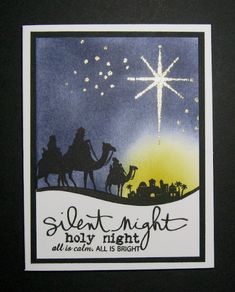 a nativity card with the birth of jesus and three wise men in silhouettes