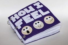 a purple book with three faces on it and the words how well written in white