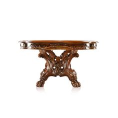 an ornately carved wooden table on white background