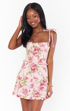 Get swept away by romance in the Lady Corset Mini. Beautiful tiers of pink florals fall to a mini hem topped with a figure flattering corset bodice that can be tightened as you please! Let her be the statement of your look paired with dainty jewelry and barely there heels. Garden Wedding Dress Guest, Pastel Floral Dress, Garden Romantic, Pastel Dress, Corset Bodice, Corset Mini Dress, Hem Top, Show Me Your Mumu, The Lady