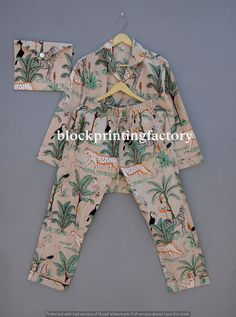 ITEM DESCRIPTION: 100% Pure cotton hand block printed night suit, perfect for summer while sipping tea on your terrace ! This pajama is made for a relaxed fit and allows for ease of movement throughout the night. Every piece can be made customized to your desires. Comes in S/M/L/XL/2XL/3XL/4XL/5XL sizes, but without any complications can be adjusted to individual measurements. MEASUREMENTS : SMALL / MEDIUM : ( EU: 36 - 38, US: 8 - 10 ) Pajama Top : Chest / Bust girth = 44 inches / 110 cm - waist girth = 44 inches / 110 cm - sleeve length = 22 inches / 57 cm - upper arm girth = 16 inches / 42 cm - length = 26 inches / 67 cm Pajama Pants: Waist girth (adjustable) = 29 inches / 74 cm - inseam = 25 inches / 64 cm - thigh = 24 inches / 62 cm - length = 40 inches / 102 cm LARGE / EXTRA LARGE : P Pajama Set Cotton, Long Pajamas, Night Wear Dress, Suit Indian, Pajama Set Long, Cotton Pajama Set, Pyjamas Set, Bridesmaid Pyjamas, Cotton Pajama Sets