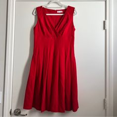 Calvin Klein Dress Size 10 Brand: Calvin Klein Condition: Nwot Color: Red Details/Measurements Laying Flat: -Slip Underneath -V Neck -Flattering -Hidden Zipper On Back -Length: 40 Inches -Pit To Pit: 17 Inches -I Ship Between 1-2 Days Fitted Red A-line Sleeveless Dress, Red Lined V-neck Midi Dress, Red Lined Midi Dress With V-neck, Red V-neck Lined Midi Dress, Calvin Klein Fitted Sleeveless V-neck Dress, Calvin Klein Fitted V-neck Sleeveless Dress, Elegant Calvin Klein Sleeveless V-neck Dress, Classic Fitted V-neck Sleeveless Dress, Red Fitted A-line Sleeveless Dress