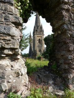 an old castle is seen through the ruins