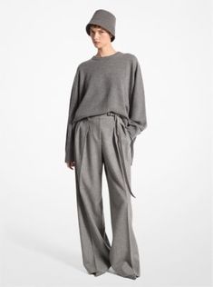 This sweater is a luxurious staple destined to become a favorite. Crafted from cashmere and designed for an intentionally oversized fit, it drapes beautifully from the shoulders and is an elegant match with pleated trousers in a similar hue. Oversized Elegant Cashmere Sweater, Elegant Wool Sweater For Loungewear, Pleated Trousers, Michael Kors Collection, Italian Fabric, Crewneck Sweater, Iceland, Crew Neck Sweater, Cashmere