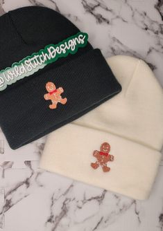 Welcome to my shop! Winter is coming, time to bundle up! This cute Gingerbread man can be embroidered on either a black or white beanie. Perfect for any holiday party or trip to the tree farm! Don't forget your matching crewneck here!: https://etsy.me/3s6yaWv Material: - 100% Acrylic Black or White Beanie - High quality thread Sizing: This is a OSFA Width: 7 1/2 Unrolled Height: 12 1/2 Care Instructions: -This can be washed on a delicate cycle, and low drying. I suggest spot cleaning if possible Casual White Hat For Holiday, Casual White Holiday Hat, White Winter Hats As Gifts, Casual White Christmas Hat, Winter Embroidered Hat As Gift, Casual White Beanie As Gift, Casual Beanie Christmas Hats, Casual Christmas Beanie Hat, Aesthetic Crochet Ideas