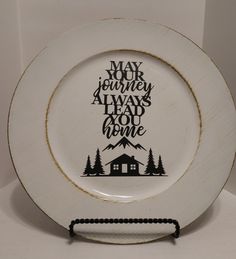 a white plate with the words may your journey always lead you home